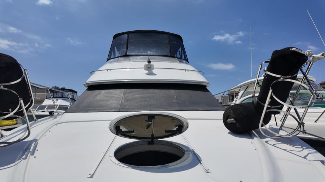 Can't Sea Me yacht bow and flybridge at the marina